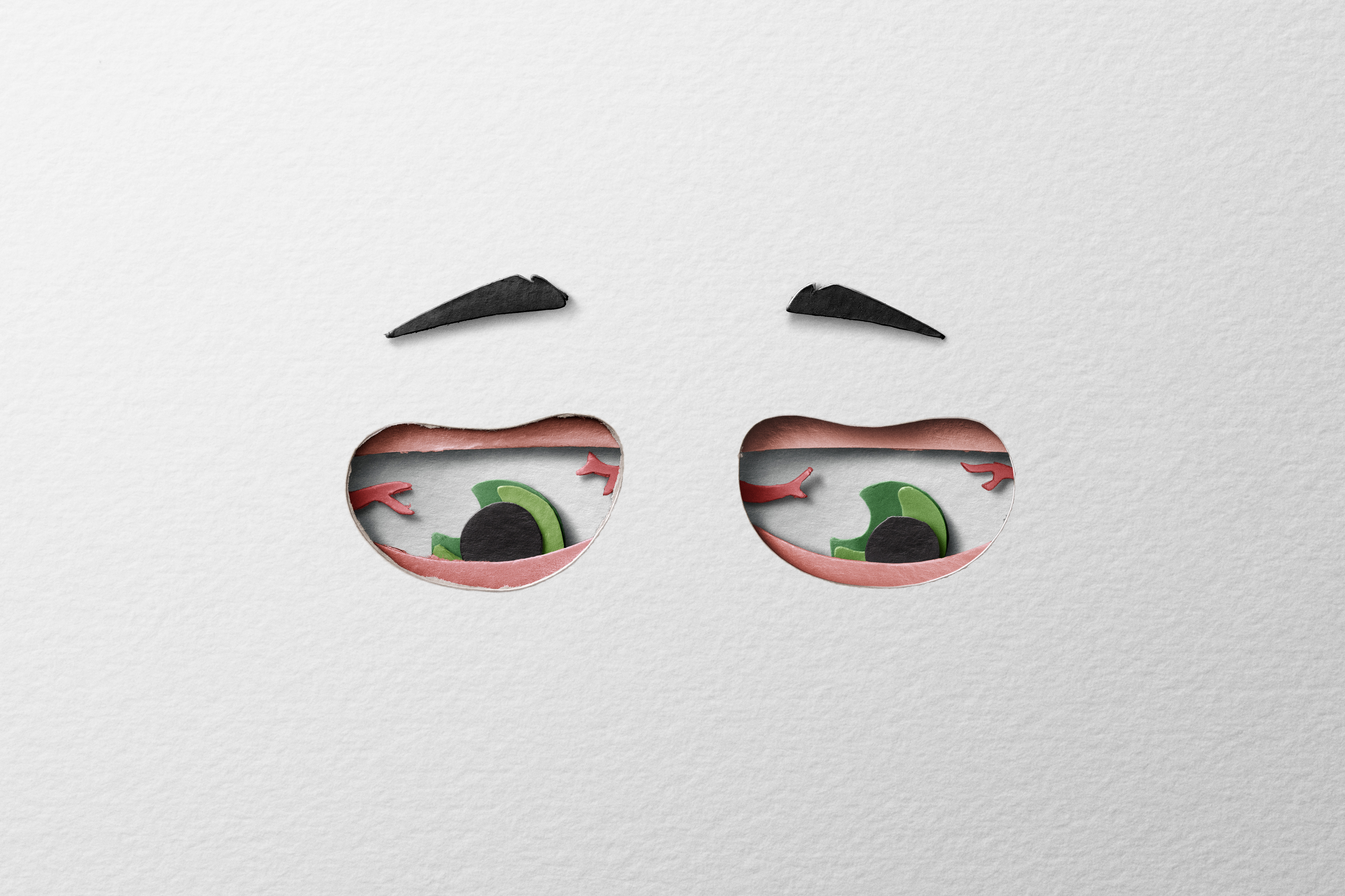 Hand-cut paper eyes showing the gaze associated with gaze palsy